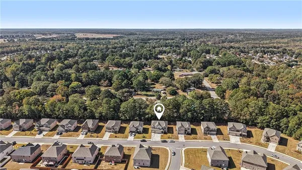 an aerial view of a city with lots of residential buildings