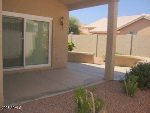 14845 West Merrell Street Goodyear, AZ 85395 - Photo 14 of 14 view of porch with green space