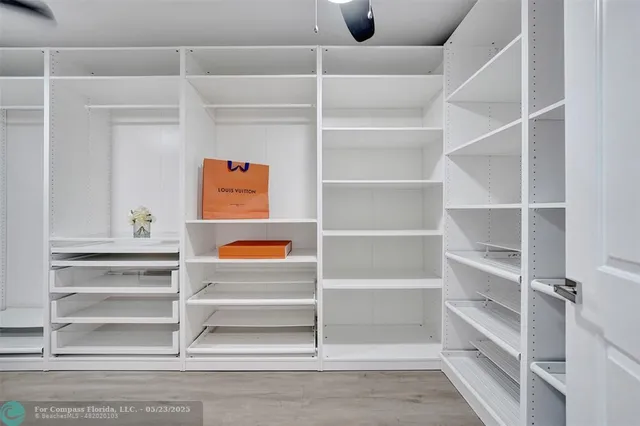 a view of balcony with a potted plant