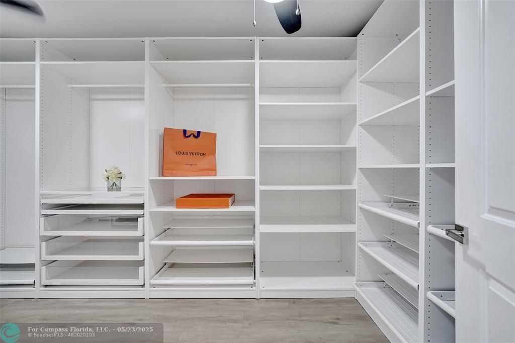 1238 Northeast 17th Avenue, Unit 2 Fort Lauderdale, FL 33304 - Photo 26 of 40 a view of an empty walk in closet