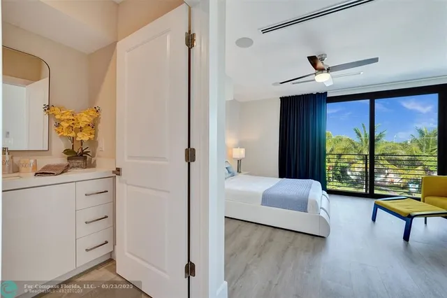 a bath tub sitting next to a window