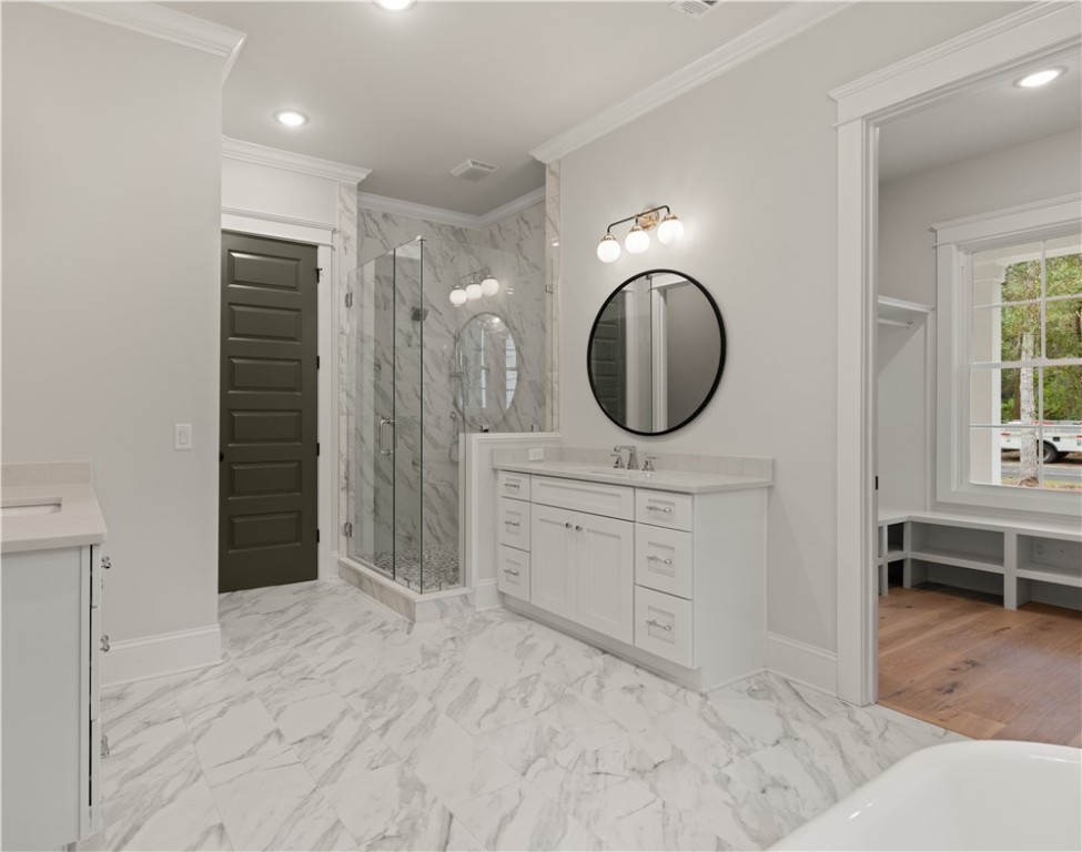 156 Rice Mill St. Simons Island, GA 31522 - Photo 16 of 36 Primary Bathroom with amazing tile