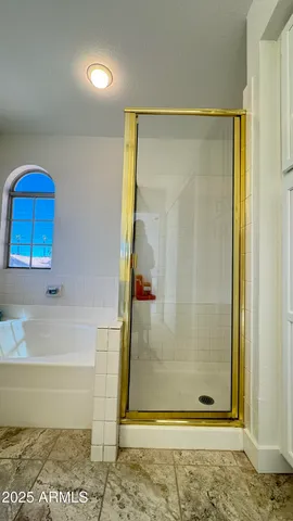 a bathroom with a toilet a sink and bathtub