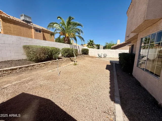 a view of a house with a snow in the yard