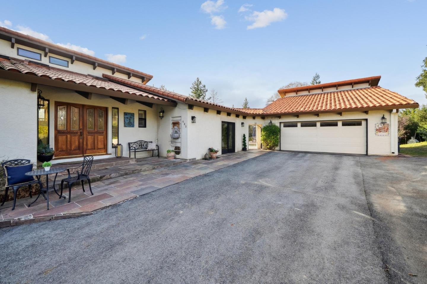 600 Ridge Top Road Los Gatos, CA 95033 - Photo 3 of 81 a view of a house with a patio