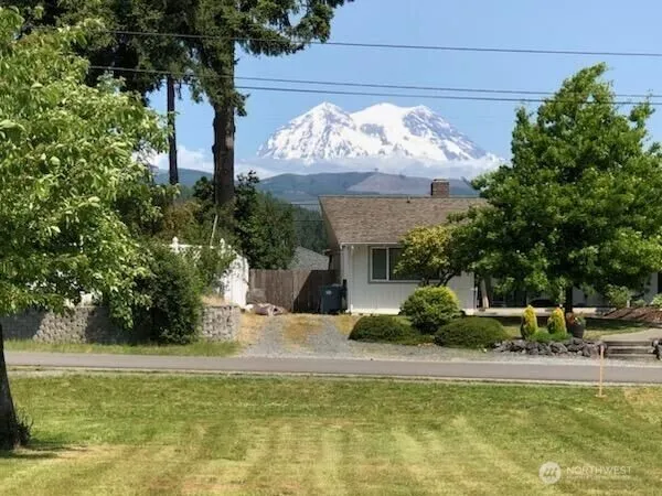 a view of a swimming pool with a garden