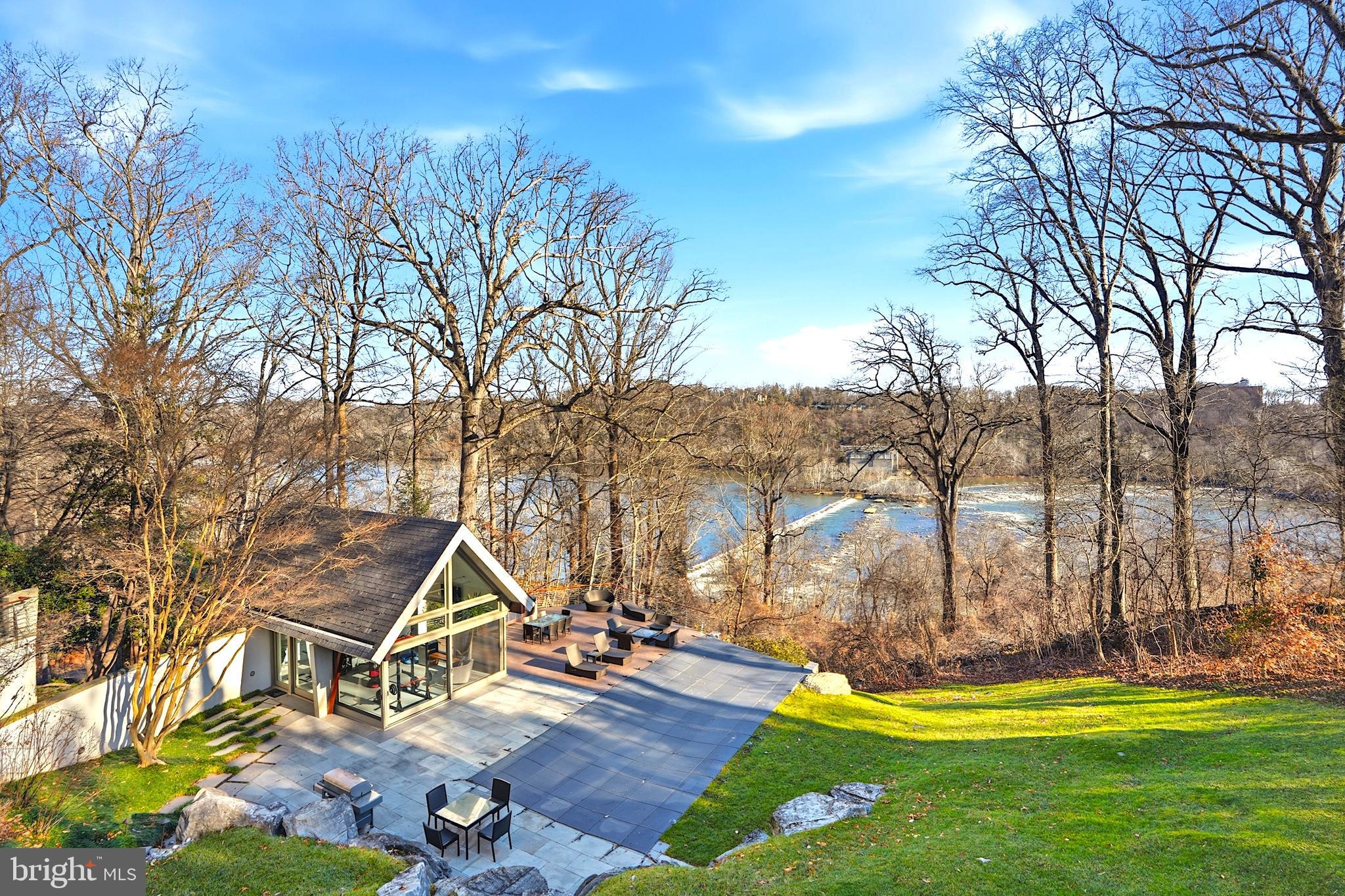 1100 Crest Lane McLean, VA 22101 - Photo 13 of 49 a view of a backyard with swimming pool