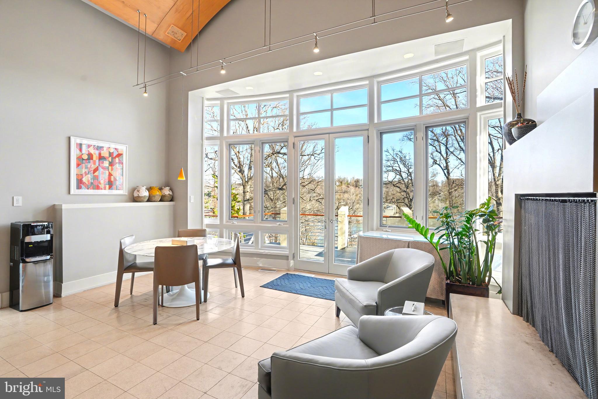 1100 Crest Lane McLean, VA 22101 - Photo 18 of 49 a living room with furniture and a large window