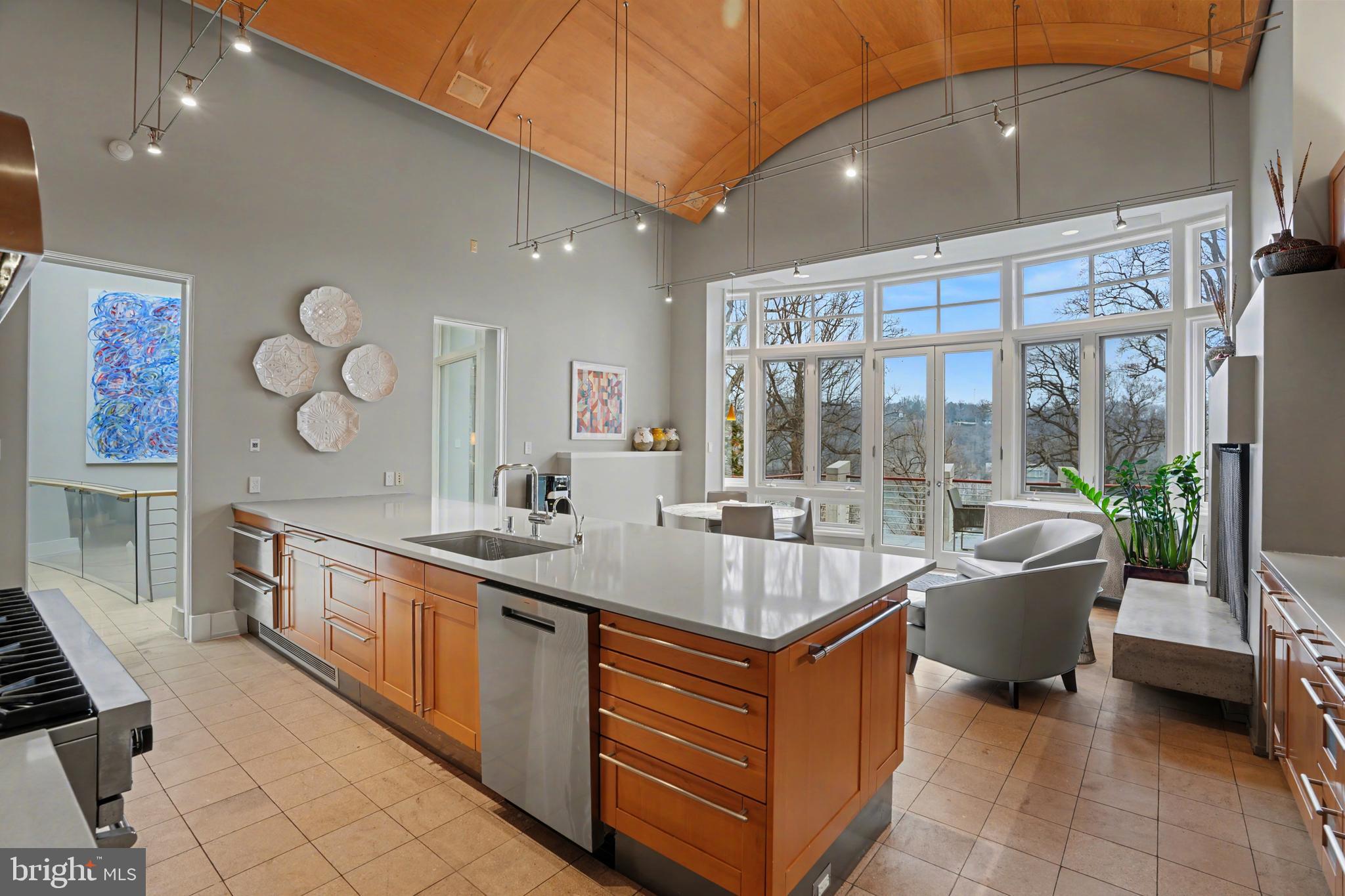 1100 Crest Lane McLean, VA 22101 - Photo 21 of 49 a large white kitchen with a large window