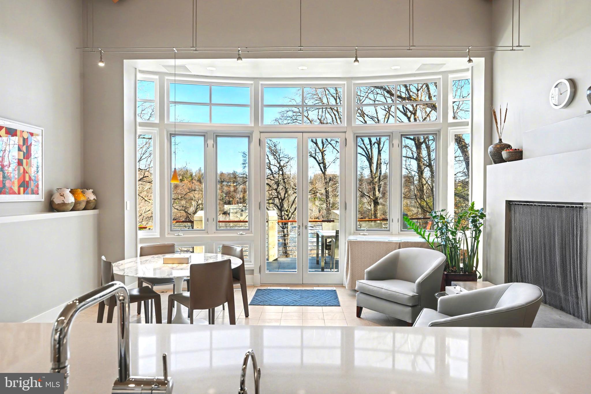 1100 Crest Lane McLean, VA 22101 - Photo 22 of 49 a living room with furniture and a large window