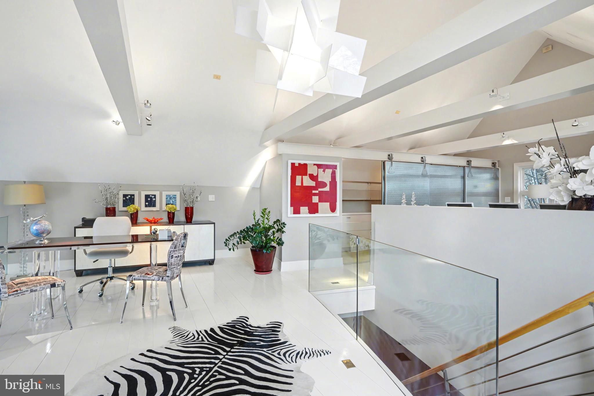 1100 Crest Lane McLean, VA 22101 - Photo 23 of 49 a living room with lots of furniture and a chandelier