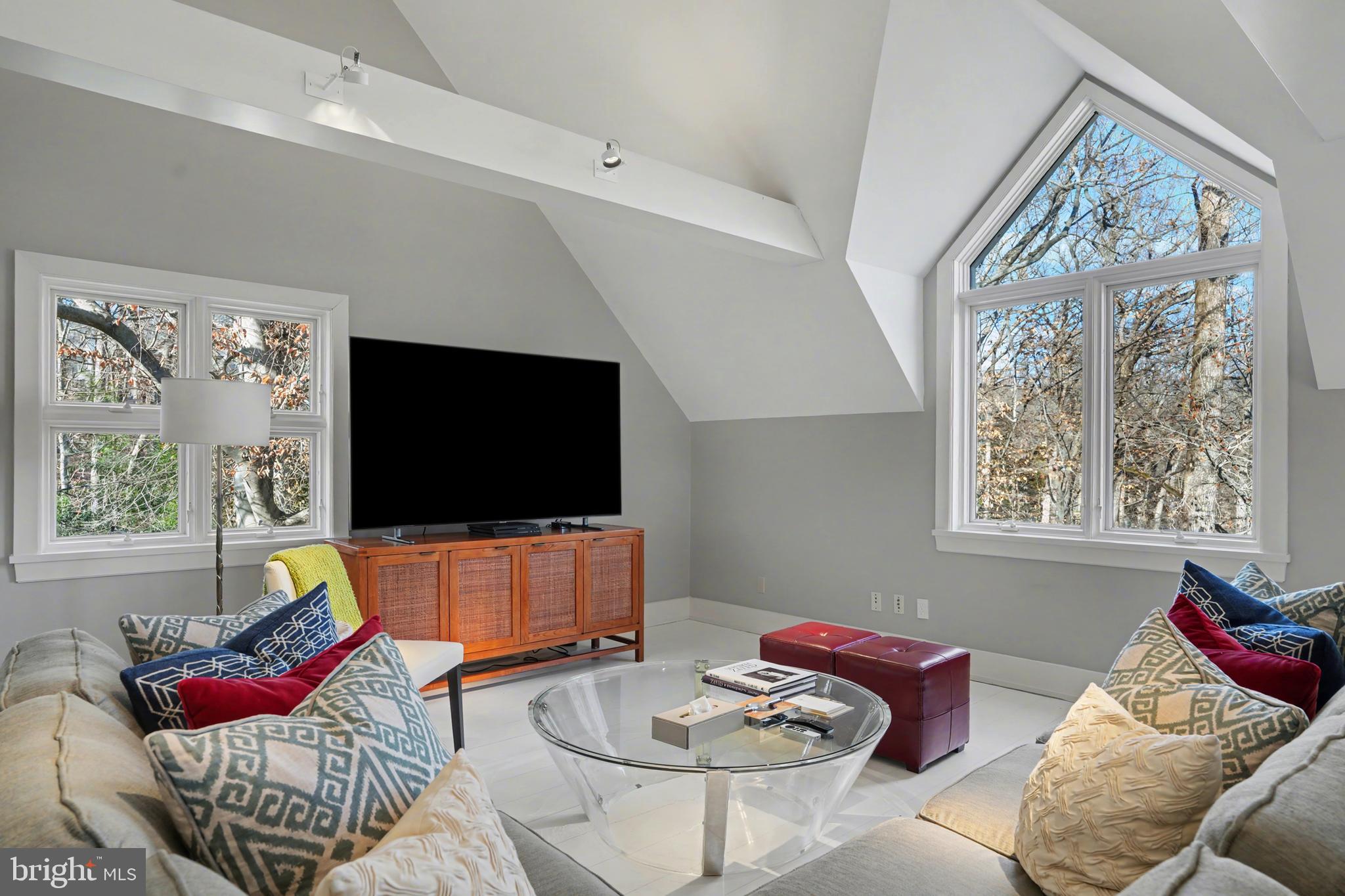 1100 Crest Lane McLean, VA 22101 - Photo 26 of 49 a living room with furniture and a flat screen tv