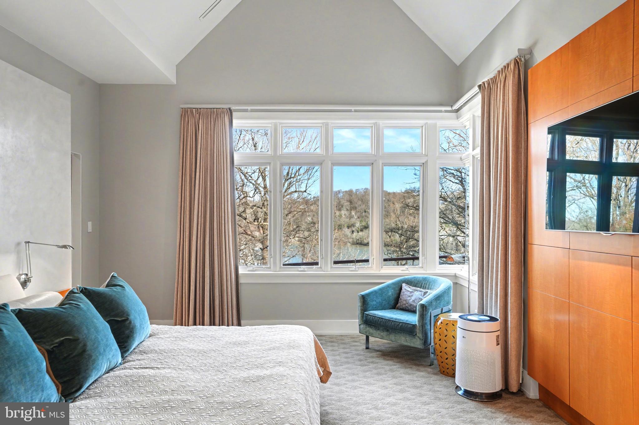 1100 Crest Lane McLean, VA 22101 - Photo 30 of 49 a bedroom with furniture and a large window