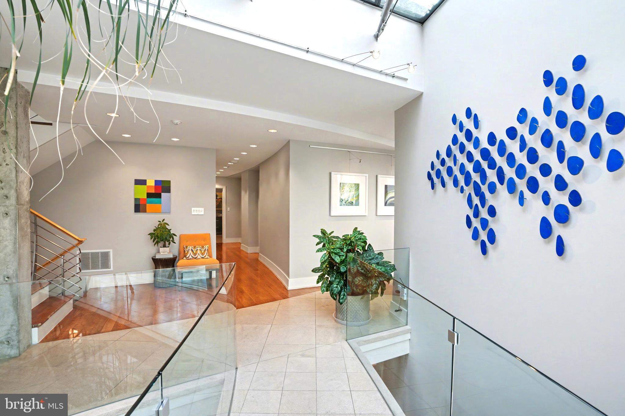 1100 Crest Lane McLean, VA 22101 - Photo 31 of 49 a living room with furniture and flowers