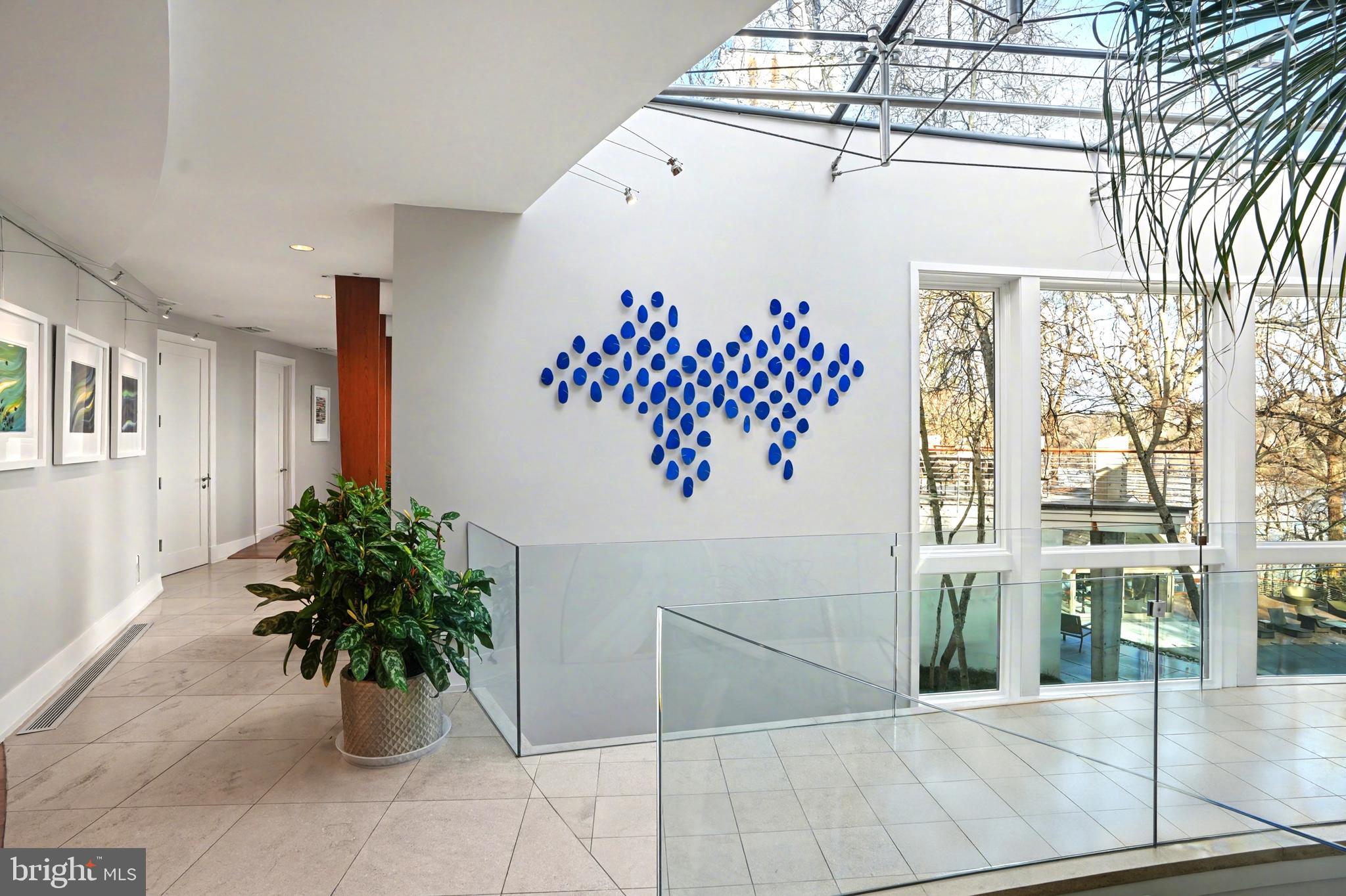 1100 Crest Lane McLean, VA 22101 - Photo 34 of 49 a view of entryway with paintings on the wall