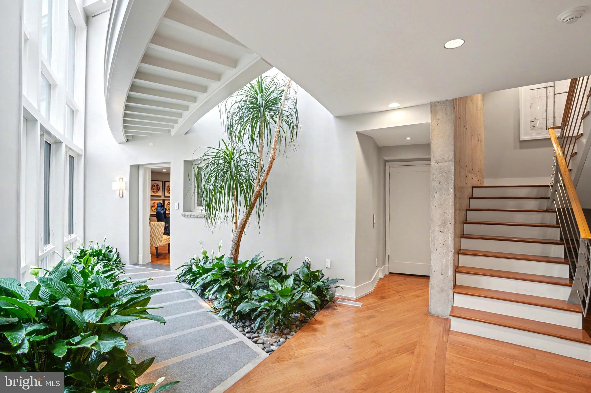 1100 Crest Lane McLean, VA 22101 - Photo 36 of 49 a view of entryway with wooden floor and a yard