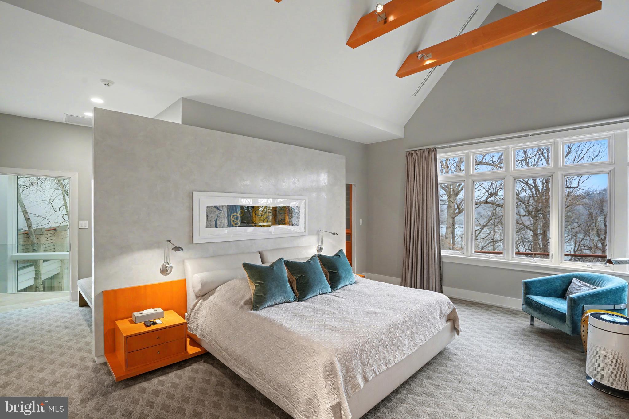 1100 Crest Lane McLean, VA 22101 - Photo 38 of 49 a bedroom with a large bed and a couch