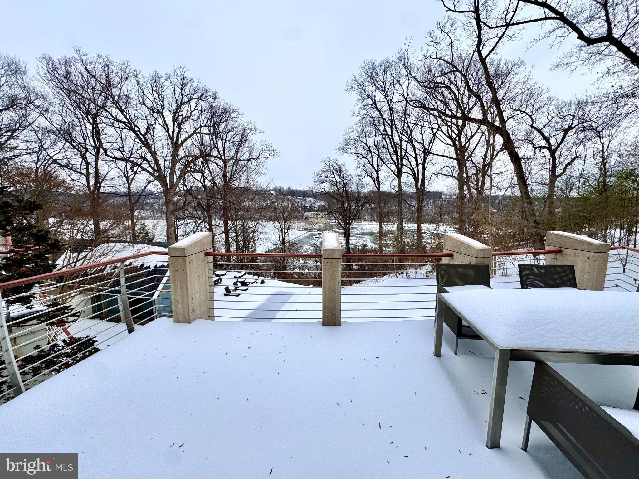 1100 Crest Lane McLean, VA 22101 - Photo 45 of 68 Serene winter retreat with snowy views.