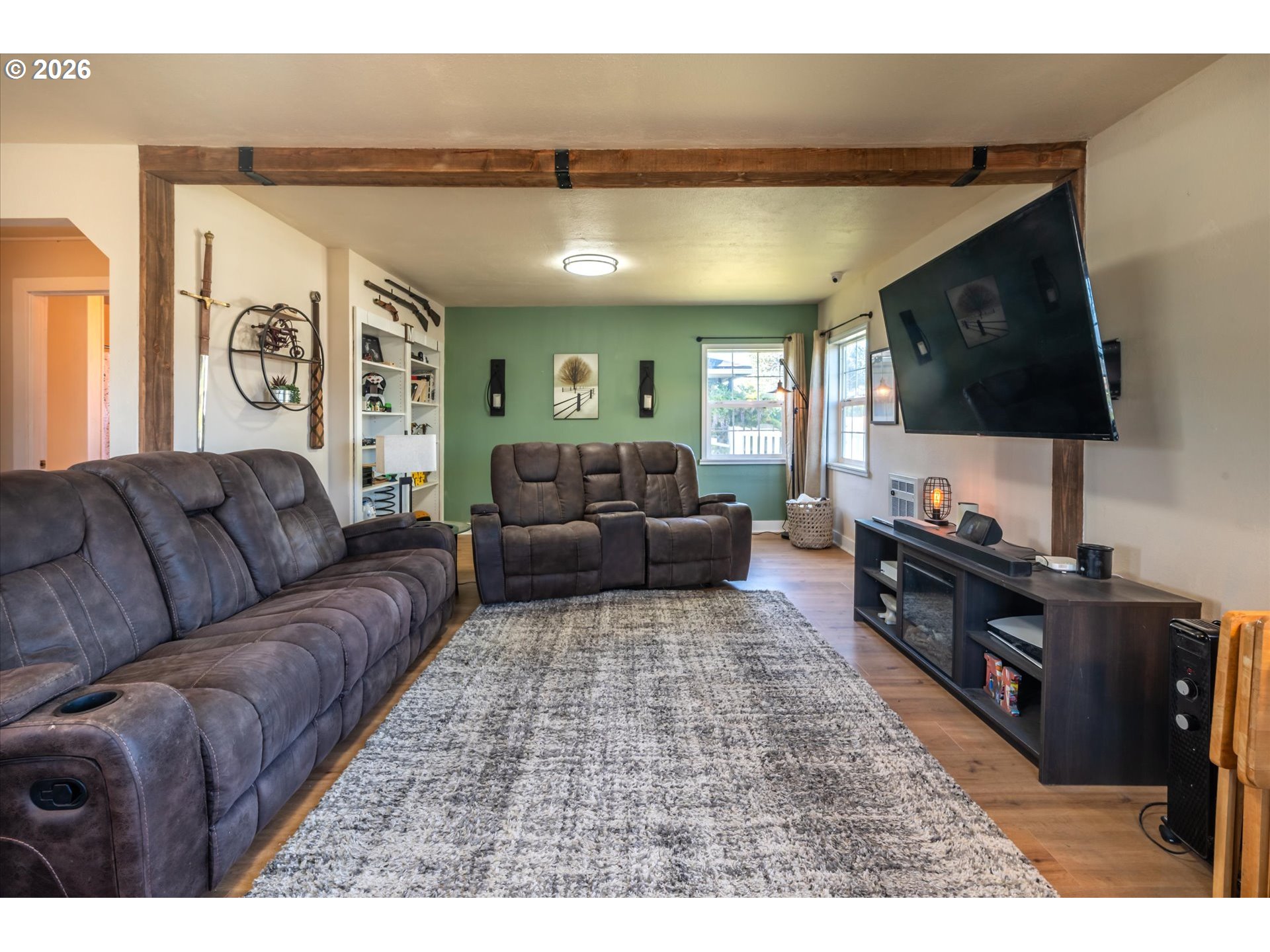 1789 14th Street North Bend, OR 97459 - Photo 8 of 43 a living room with furniture and a flat screen tv