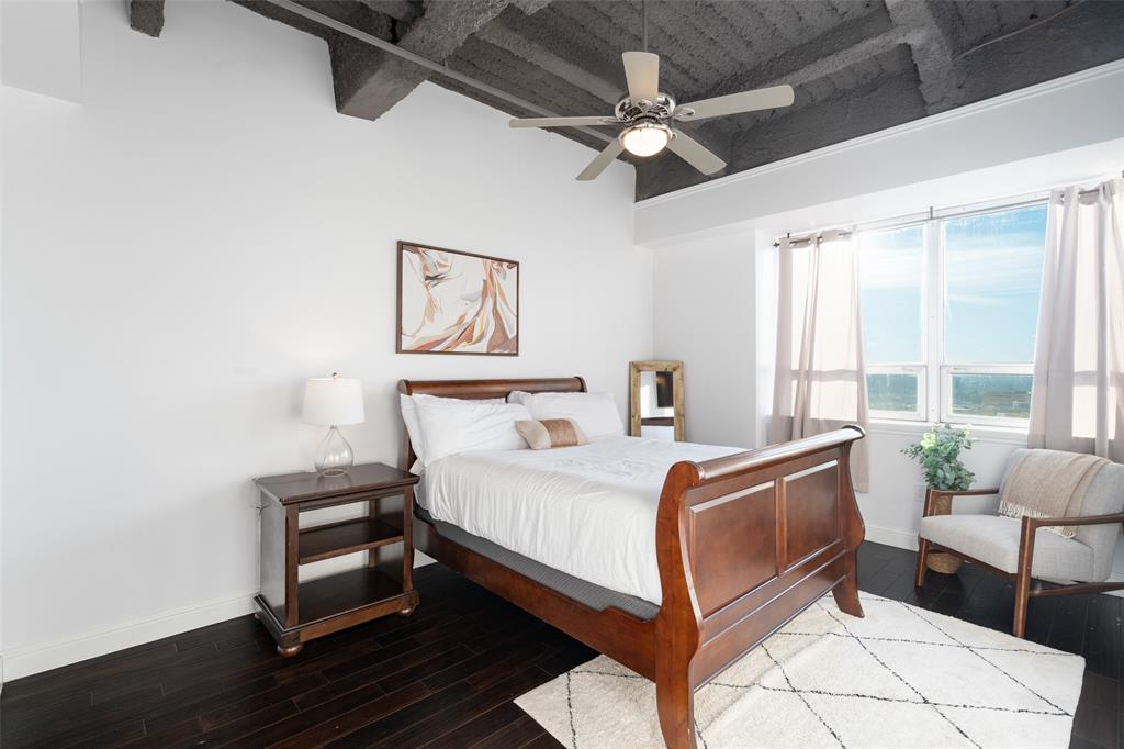 511 North Akard Street, Unit 1502 Dallas, TX 75201 - Photo 10 of 30 Primary bedroom overlooks downtown