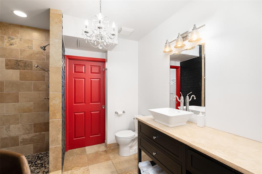 511 North Akard Street, Unit 1502 Dallas, TX 75201 - Photo 11 of 30 Primary bathroom opens to walk in closet via(locking) pocket door