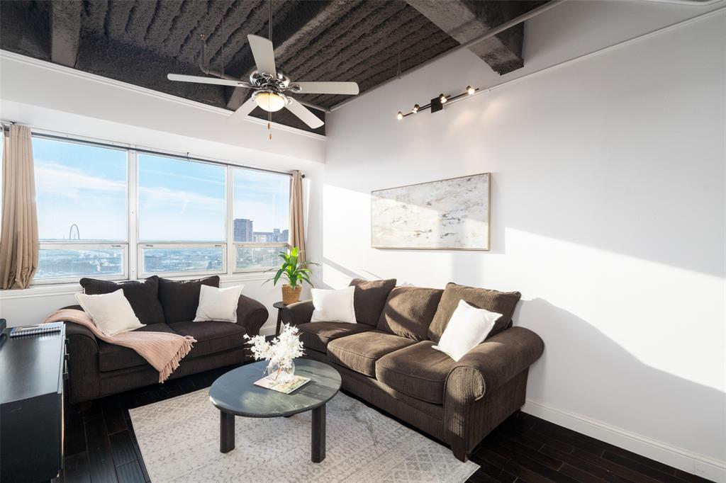 511 North Akard Street, Unit 1502 Dallas, TX 75201 - Photo 9 of 30 Row of windows brings in the natural light