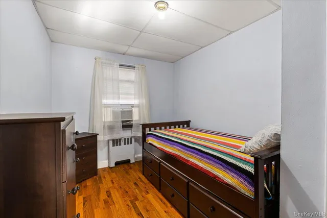 a room with a bed and a window