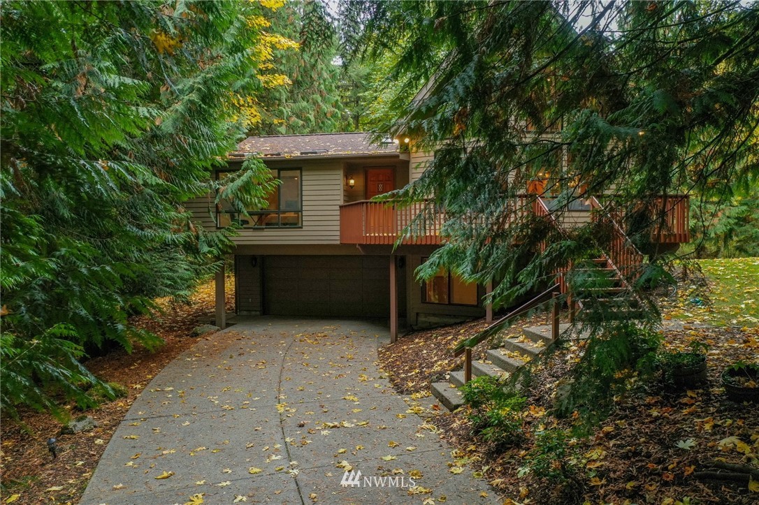17418 Southeast 106th Street Renton, WA 98059 - Photo 2 of 39 a view of a house with a yard