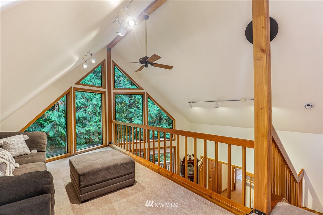 17418 Southeast 106th Street Renton, WA 98059 - Photo 23 of 39 a living room with furniture and a large window