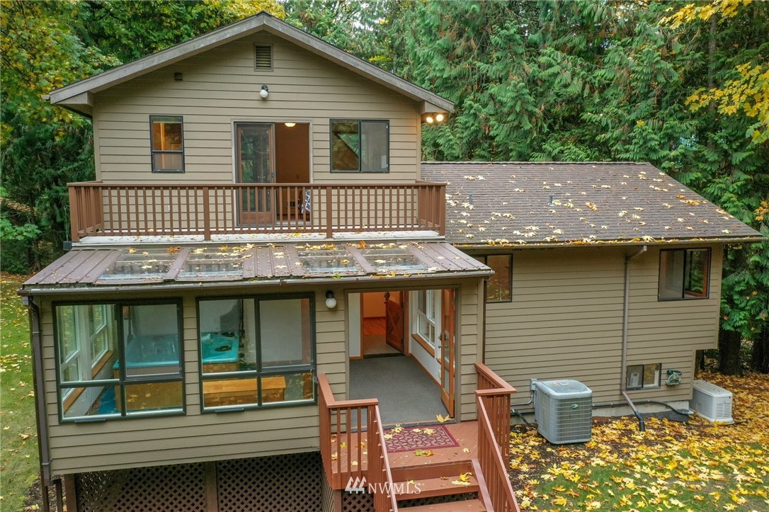 17418 Southeast 106th Street Renton, WA 98059 - Photo 33 of 39 a view of house with roof deck and entertaining space