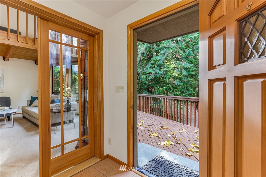 17418 Southeast 106th Street Renton, WA 98059 - Photo 7 of 39 a view of staircase with large window