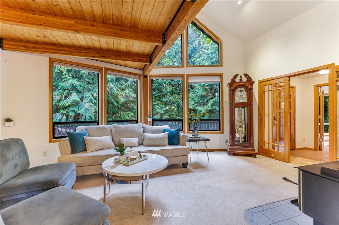 17418 Southeast 106th Street Renton, WA 98059 - Photo 8 of 39 a living room with furniture and a large window