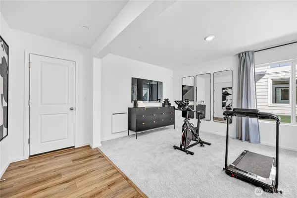 a view of a room with gym equipment