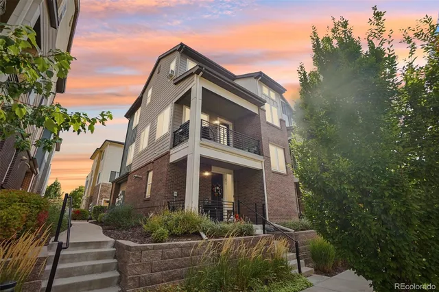 aerial view of a house with a yard
