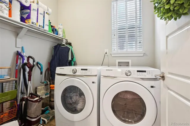 a utility room with dryer and washer
