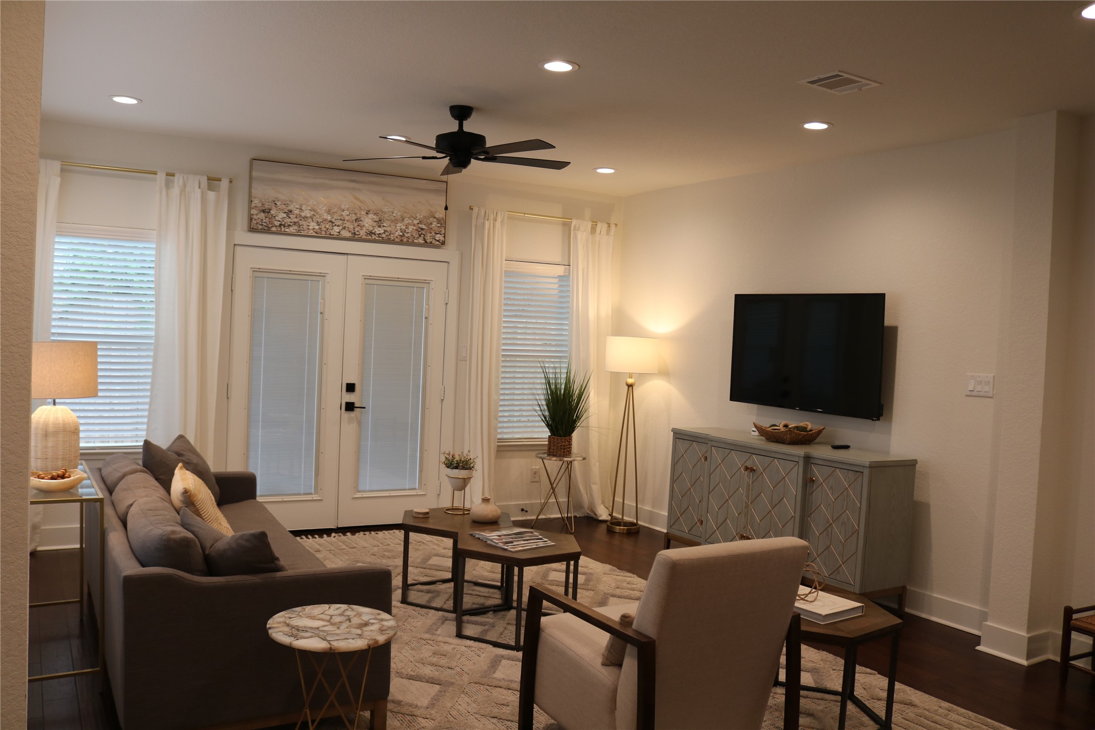 4714 Fisk Street Houston, TX 77009 - Photo 8 of 20 a living room with furniture and a flat screen tv