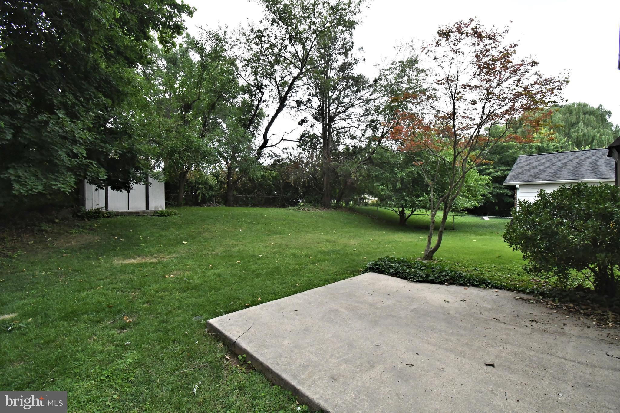 500 Burton Road Oreland, PA 19075 - Photo 45 of 54 Rear patio and yard