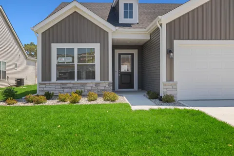 a front view of house with yard