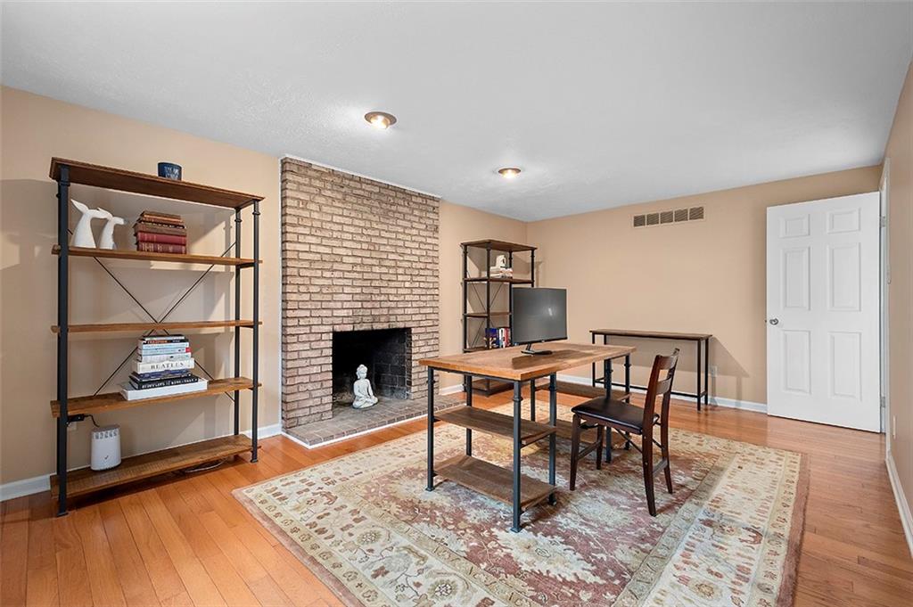 1550 Hastings Mill Road Pittsburgh, PA 15241 - Photo 13 of 25 a view of a livingroom with furniture and a fireplace
