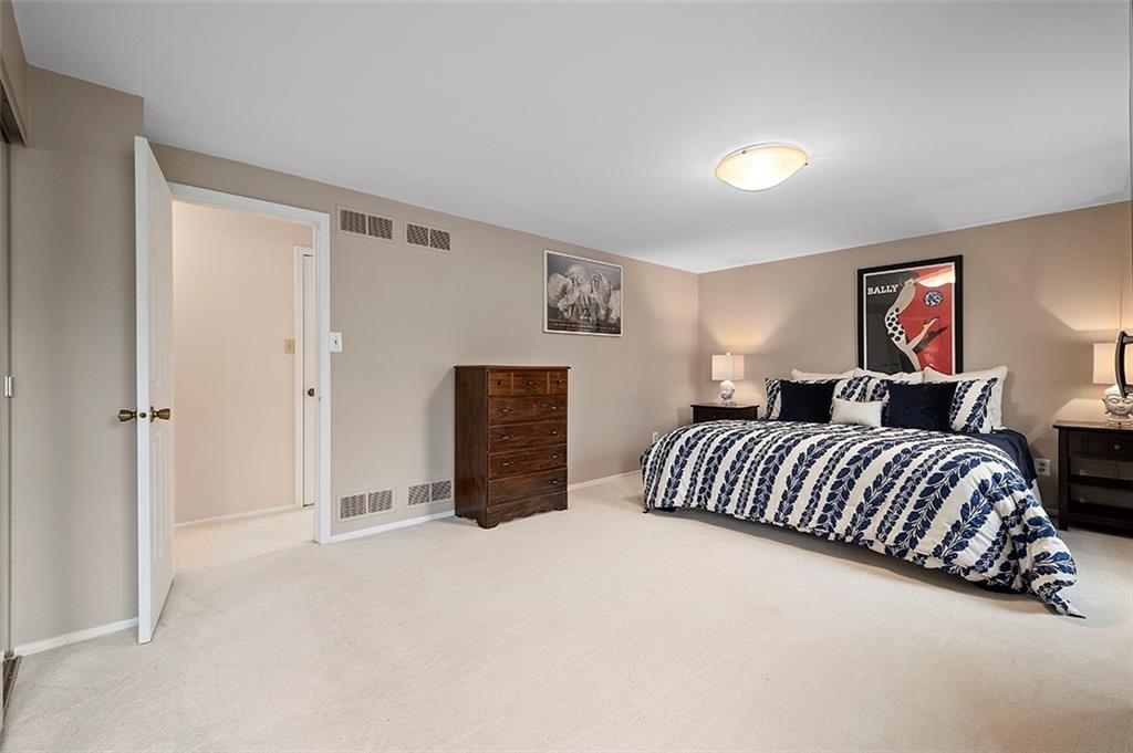 1550 Hastings Mill Road Pittsburgh, PA 15241 - Photo 14 of 25 a bedroom with a bed and dresser