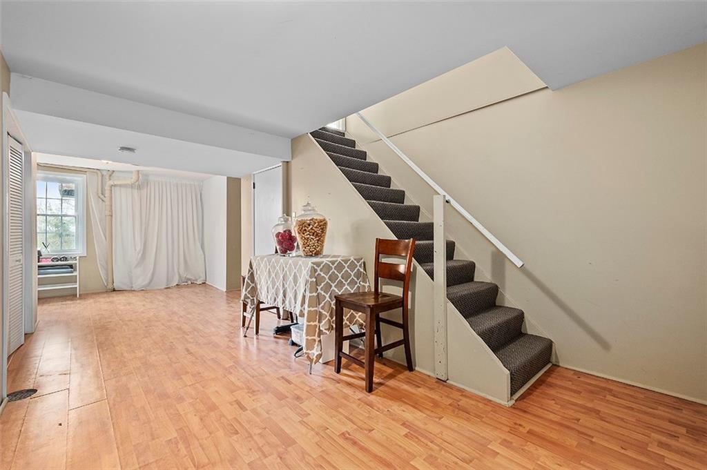 1550 Hastings Mill Road Pittsburgh, PA 15241 - Photo 22 of 25 a view of entryway with wooden floor and stairs