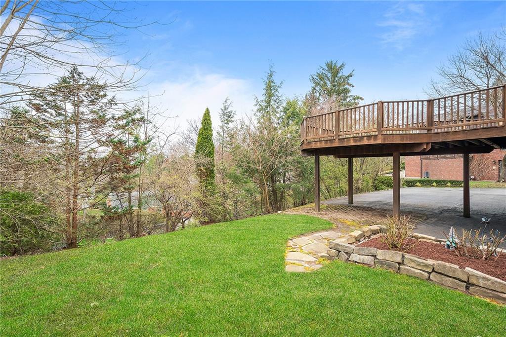 1550 Hastings Mill Road Pittsburgh, PA 15241 - Photo 24 of 25 a view of a deck with a backyard