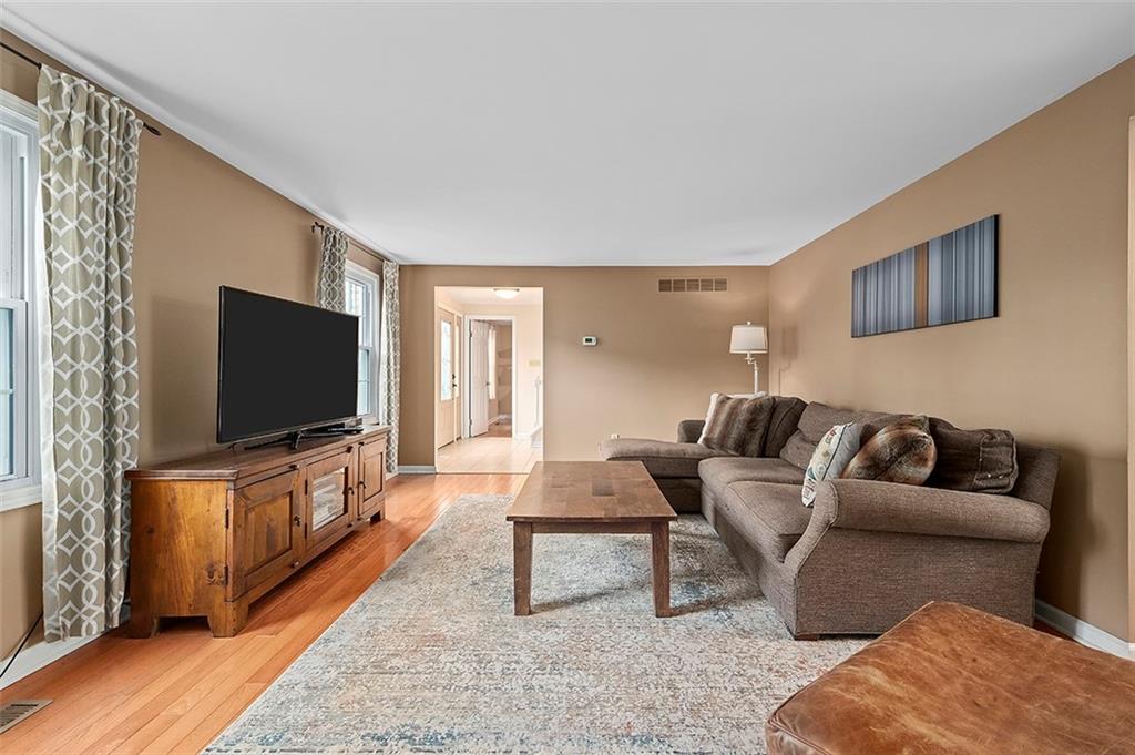 1550 Hastings Mill Road Pittsburgh, PA 15241 - Photo 5 of 25 a living room with furniture and a flat screen tv