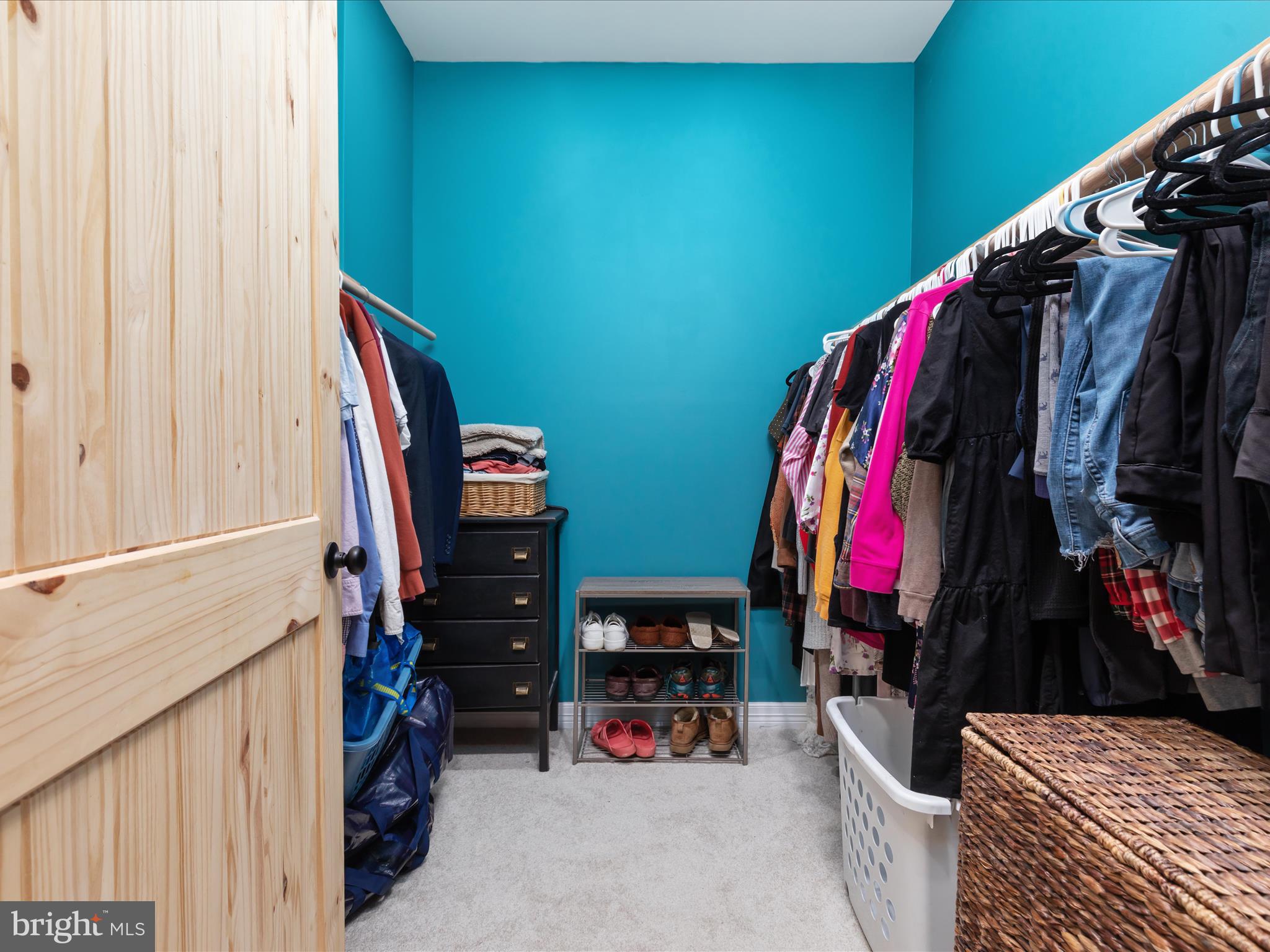 838 Dollar Lane Bunker Hill, WV 25413 - Photo 32 of 68 a view of walk in closet with clothes and shoes