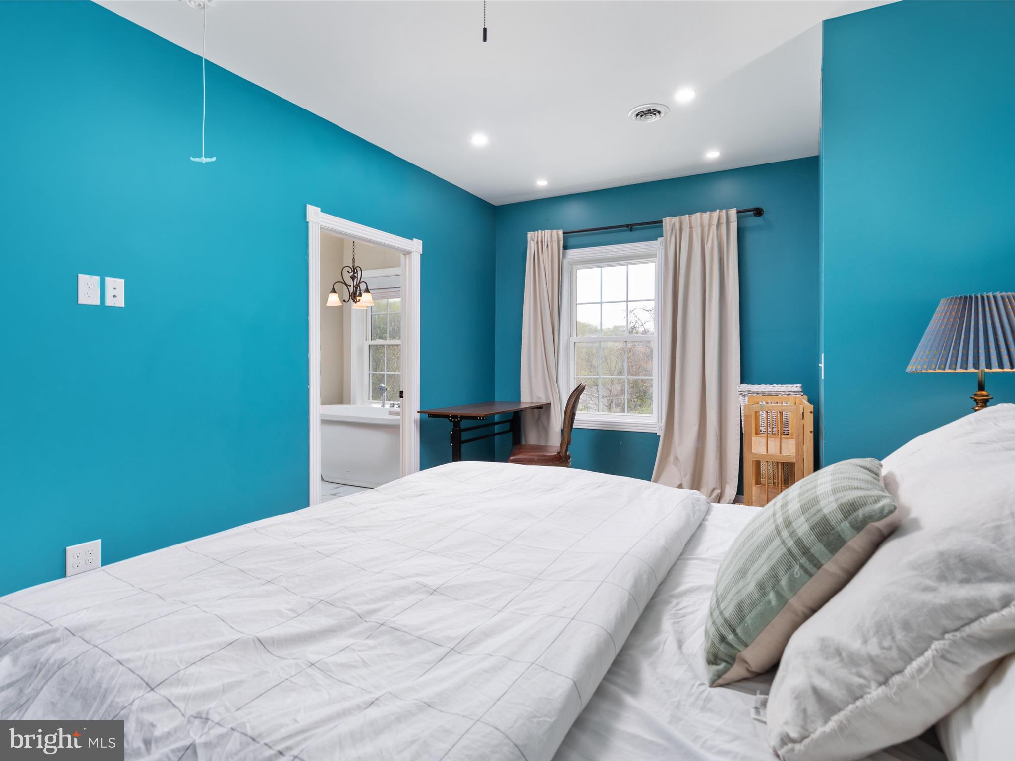 838 Dollar Lane Bunker Hill, WV 25413 - Photo 33 of 68 a bedroom with a large bed and a window