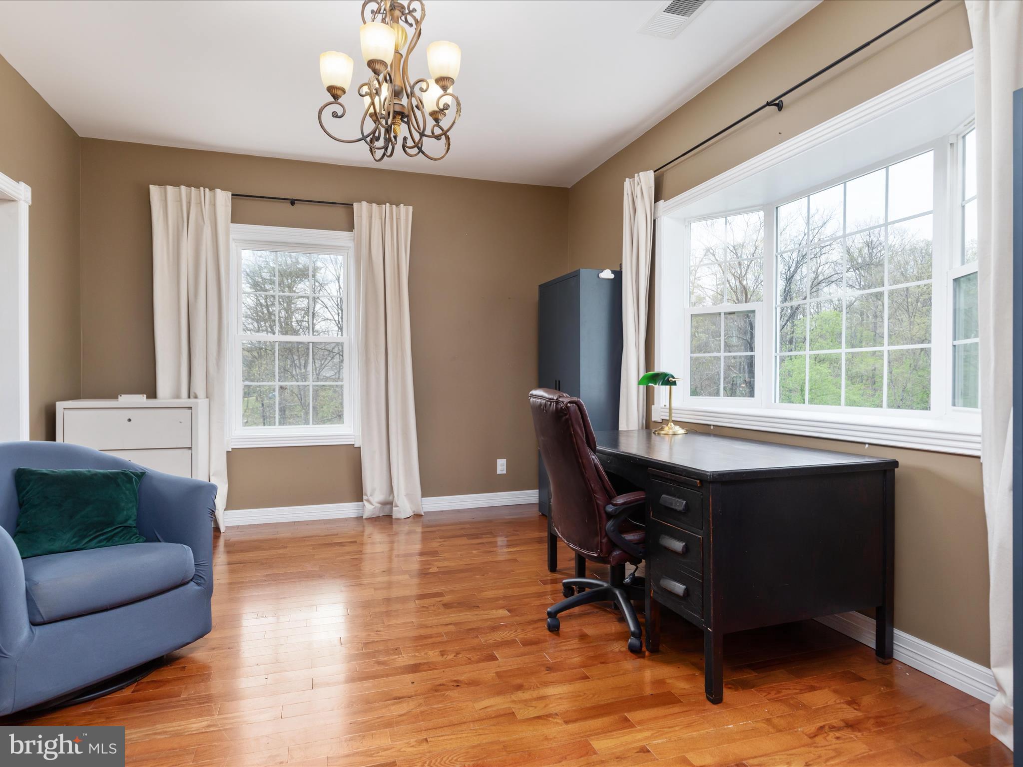 838 Dollar Lane Bunker Hill, WV 25413 - Photo 44 of 68 a view of a livingroom with workspace and a window