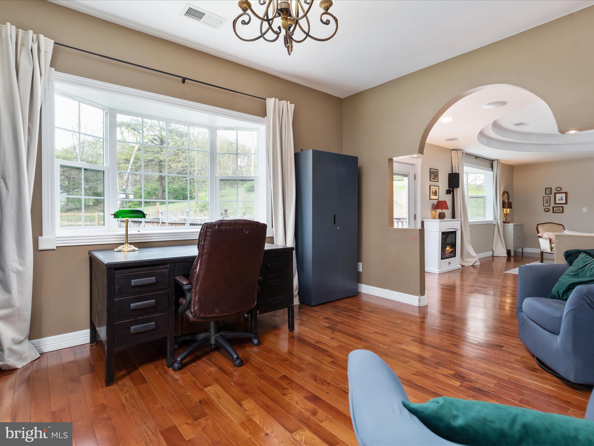 838 Dollar Lane Bunker Hill, WV 25413 - Photo 45 of 68 a view of a livingroom with furniture and a large window