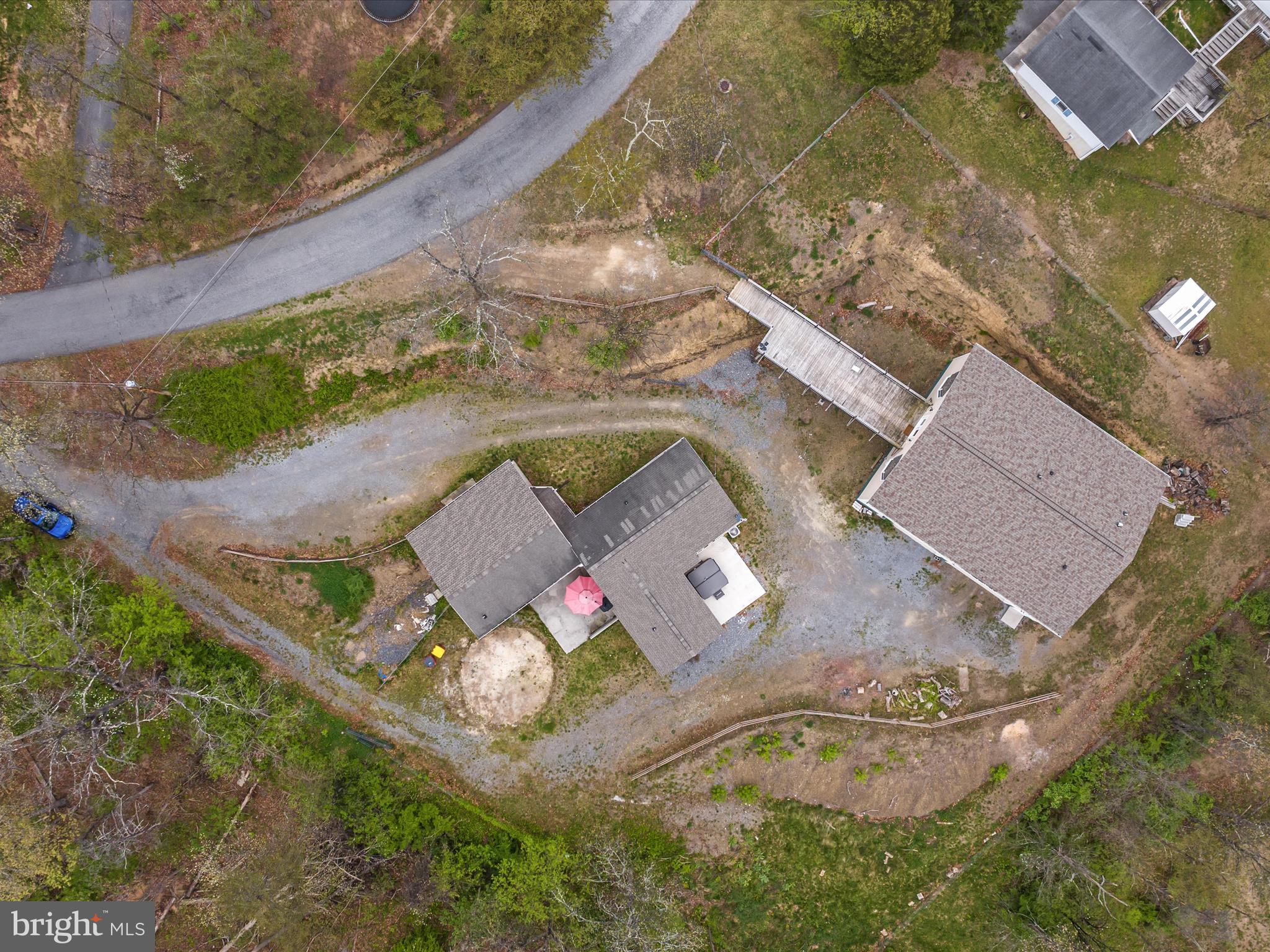 838 Dollar Lane Bunker Hill, WV 25413 - Photo 60 of 68 an aerial view of a house with outdoor space