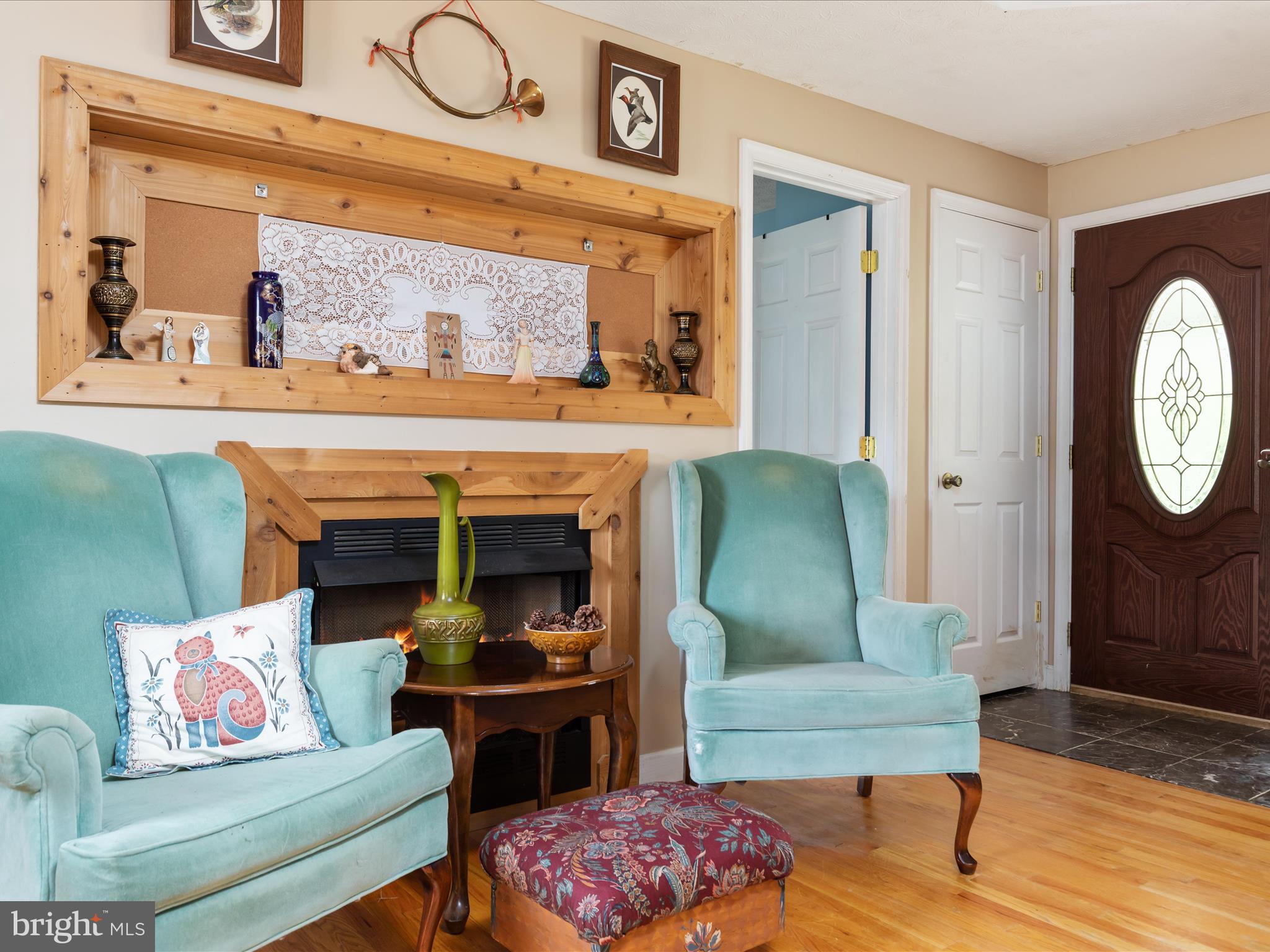838 Dollar Lane Bunker Hill, WV 25413 - Photo 6 of 68 a living room with furniture and a fireplace