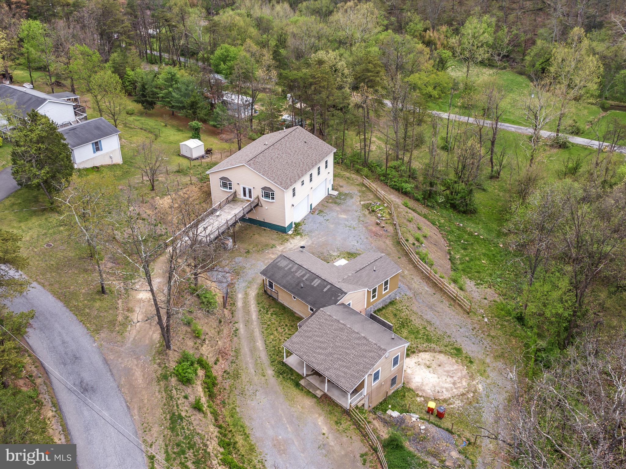 838 Dollar Lane Bunker Hill, WV 25413 - Photo 63 of 68 an aerial view of a house with outdoor space
